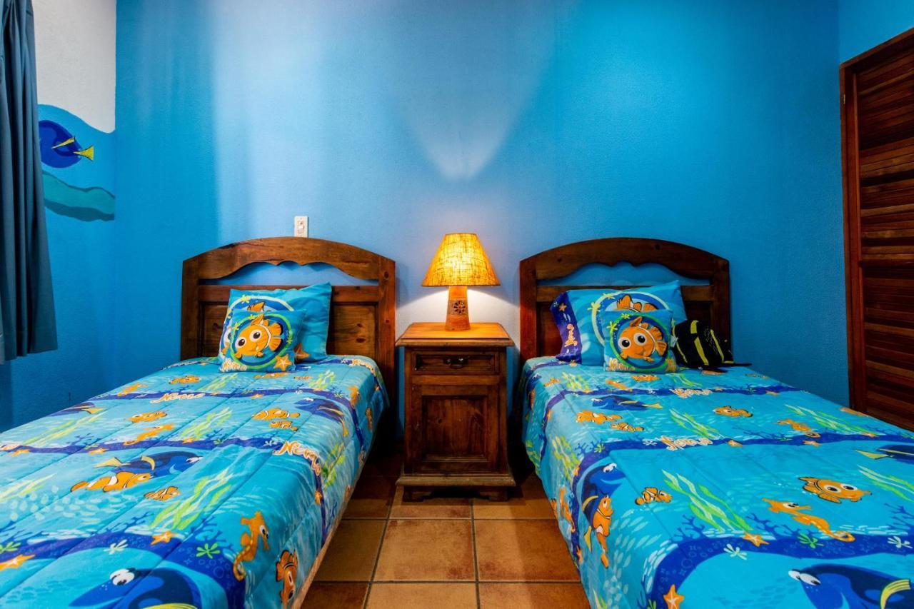 Warm Interiors And Orange Hues On Ground Floor In Front Of Beach Playa Flamingo Habitación foto